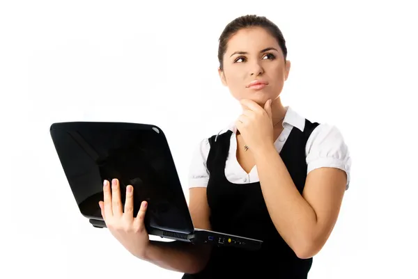 Mujer reflexiva con un ordenador portátil —  Fotos de Stock