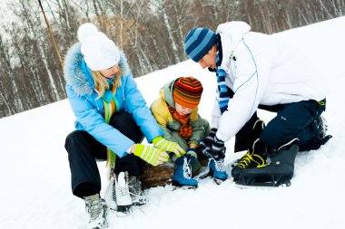 Family ice- skating clipart