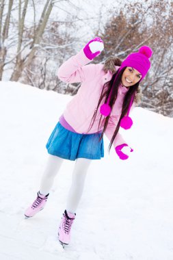 Girl ice skating clipart