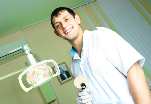 Dentist at workplace — Stock Photo, Image