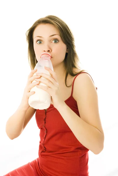 Girl with a bottle of milk — Stock Photo, Image