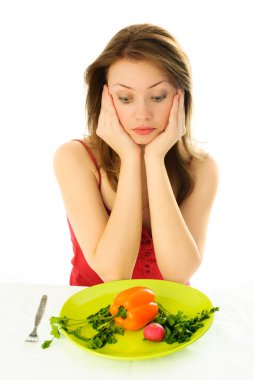 Sad girl keeping a diet clipart