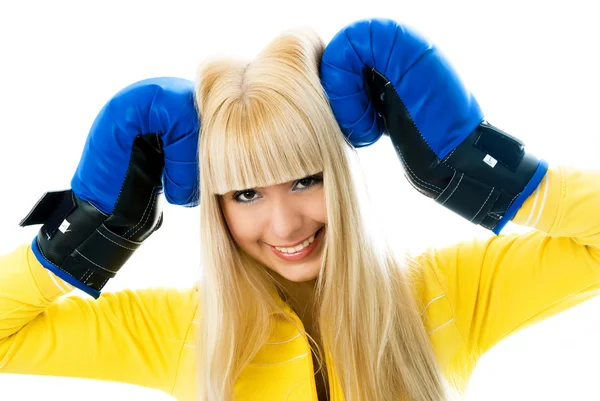 Happy girl wearing boxing gloves — Stock Photo, Image