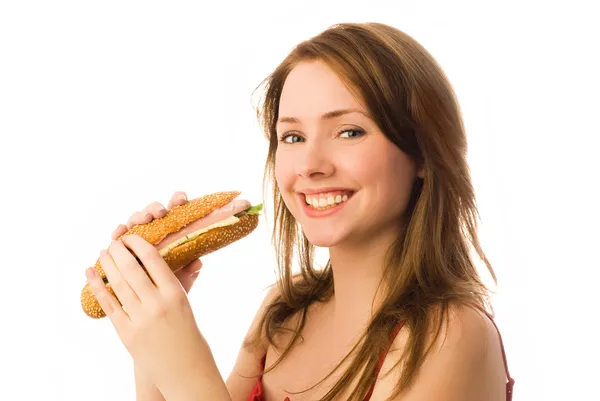 Glückliche junge Frau mit Hot-Dog — Stockfoto