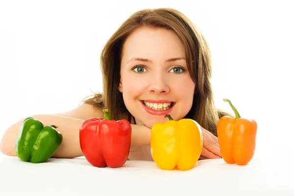 Beautiful woman with peppers — Stock Photo, Image