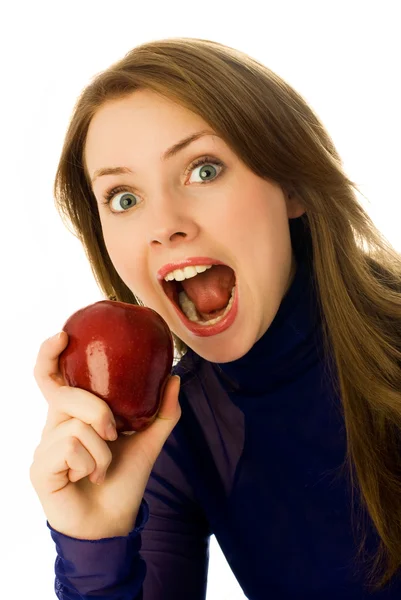 Belle femme manger une pomme — Photo