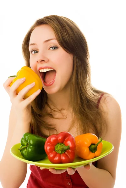 Mulher bonita comer pimentas — Fotografia de Stock