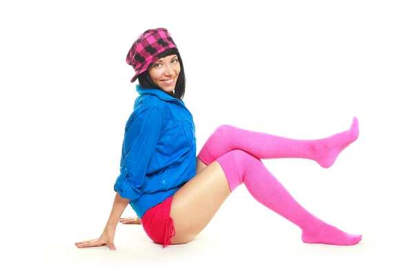 Brunette meisje dragen kleurrijke kleding — Stockfoto