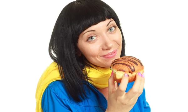 Meisje eten een broodje met chocolade — Stockfoto