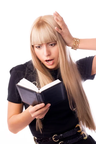 Shocked businesswoman with a diary — Stock Photo, Image