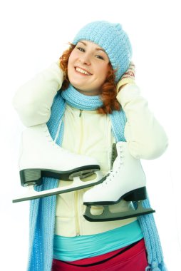 Cheerful young woman goes ice-skating clipart