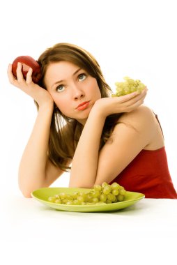 Beautiful woman unwilling to eat fruit clipart