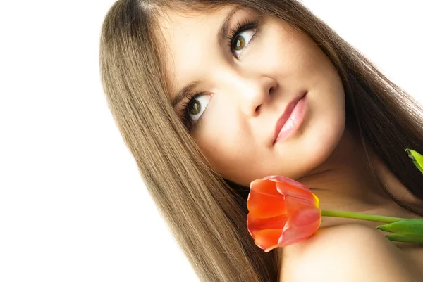 Hermosa mujer con un tulipán — Foto de Stock