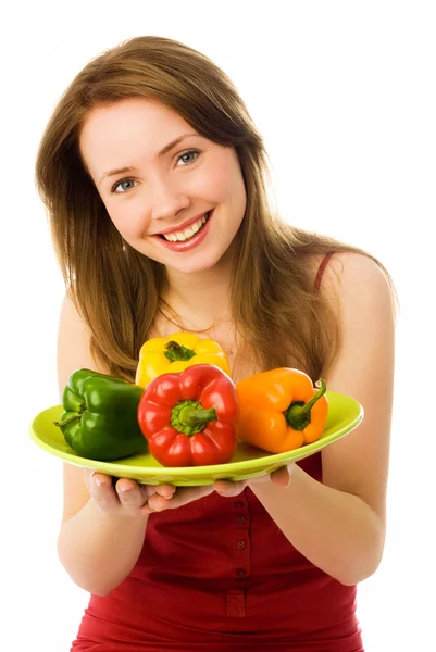 Krásná šťastná žena s paprikami — Stock fotografie