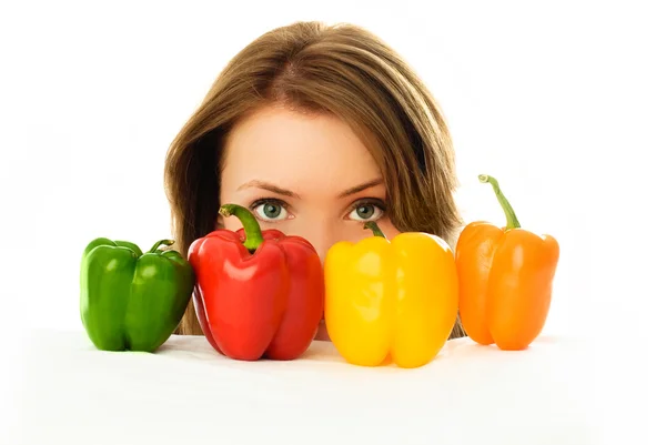 Pretty girl with peppers — Stock Photo, Image