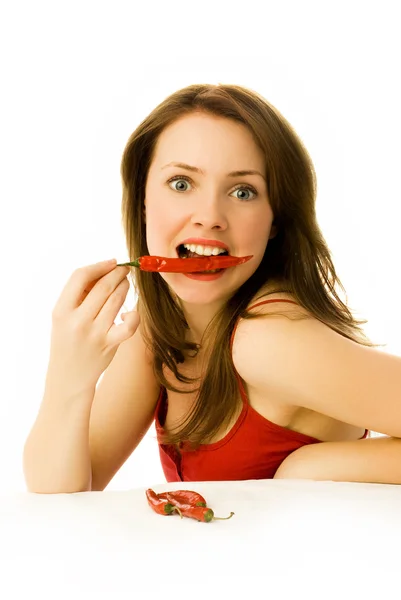 Sexy vrouw met rode chilipepertjes — Stockfoto
