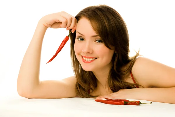 Sexy woman with red chili peppers — Stock Photo, Image