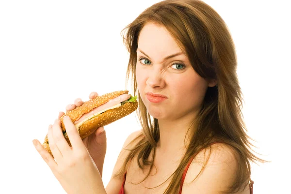 Jovem mulher odiando fast food — Fotografia de Stock