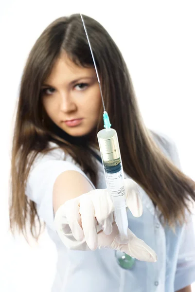 Mulher que administra uma injeção — Fotografia de Stock