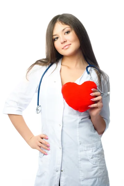 Cardiólogo con almohada en forma de corazón — Foto de Stock