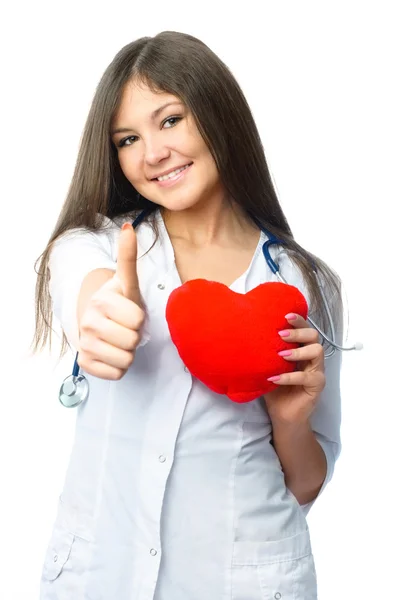 Cardiologist with a heart shaped pillow — Stock Photo, Image