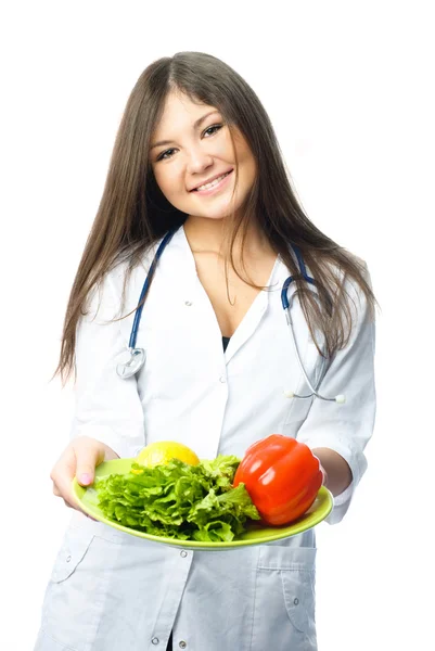 Доктор с овощами — стоковое фото