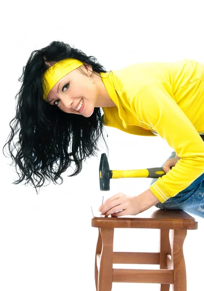 stock image Beautiful woman with a hammer