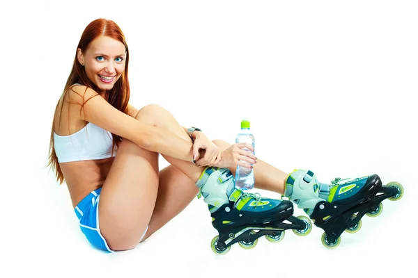 Happy girl with rollerskates — Stock Photo, Image