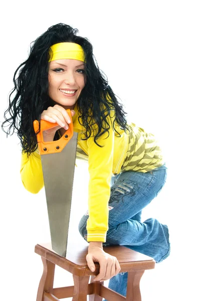 Young beautiful woman with a saw — Stock Photo, Image