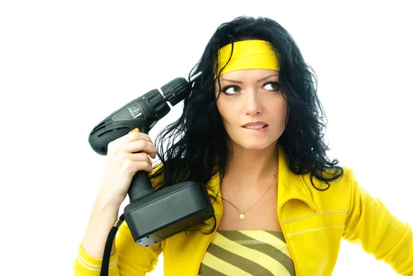 Beautiful woman with a drill — Stock Photo, Image