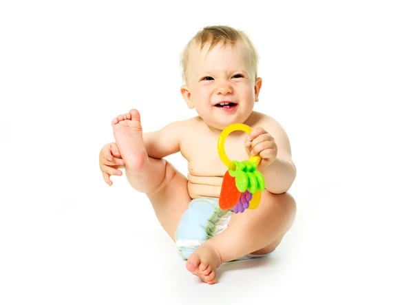 Bebé con un juguete —  Fotos de Stock