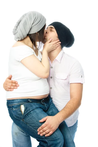 Pregnant woman and her husband kissing — Stock Photo, Image