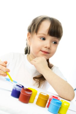 Girl painting with watercolor