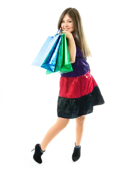 Mooi meisje met boodschappentassen — Stockfoto