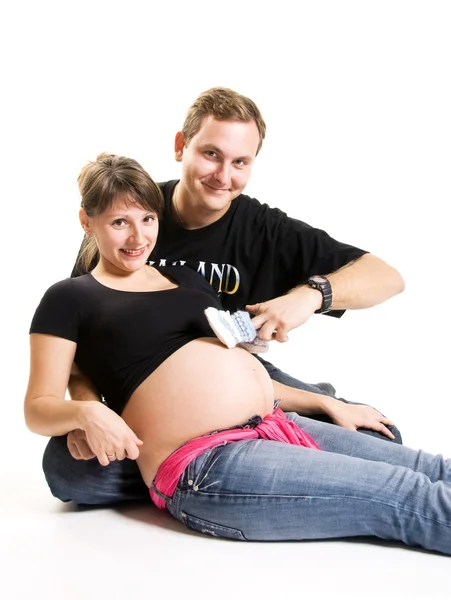 Junger Mann und seine schwangere Frau — Stockfoto