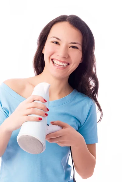 Menina feliz com um secador de cabelo — Fotografia de Stock