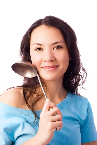 Donna con un cucchiaio da portata — Foto Stock