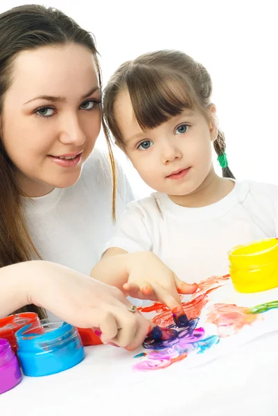 Mother and daughter painting with finger paints — Stock Photo, Image