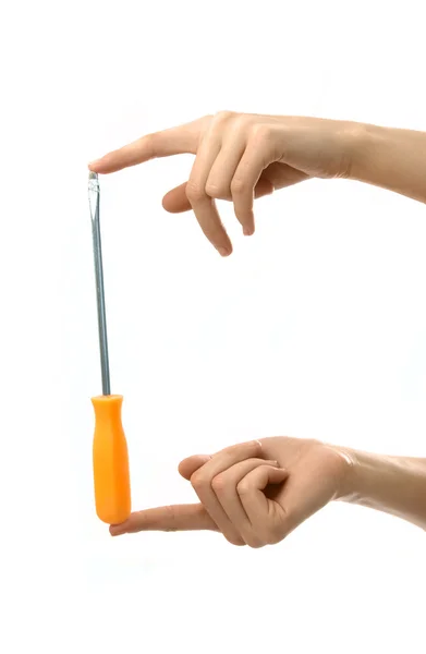 stock image Orange screwdriver between two hands