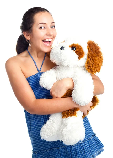 Счастливая девушка с игрушкой — стоковое фото