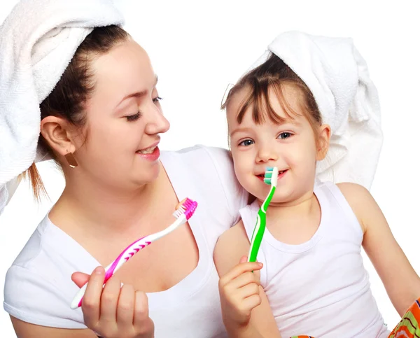 Matka i córka myją zęby — Zdjęcie stockowe