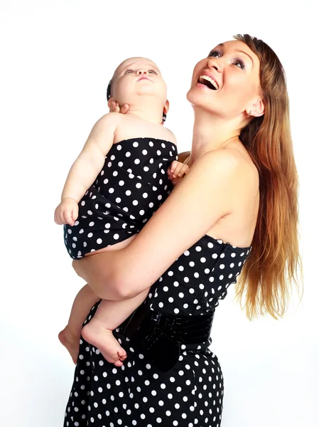 Mother holding her daughter — Stock Photo, Image