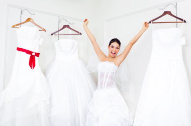 Girl choosing a wedding dress clipart