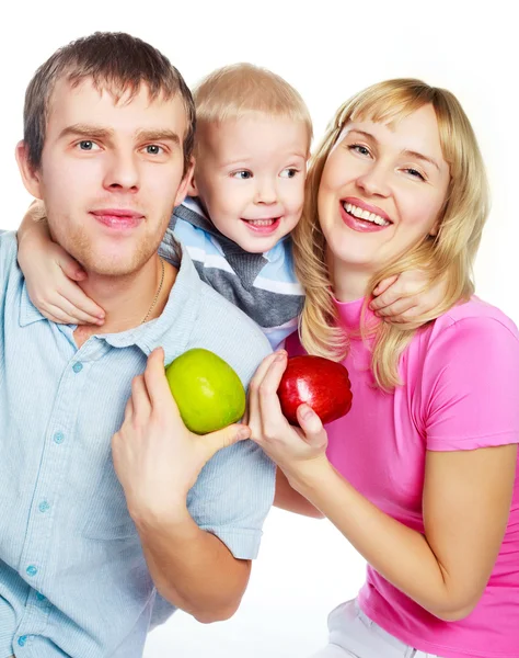 Familie isst Äpfel — Stockfoto