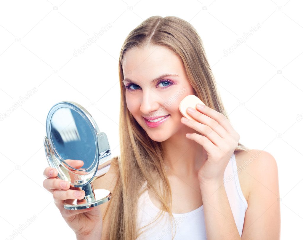 Woman removing makeup