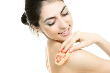 Woman washing her body with soap clipart