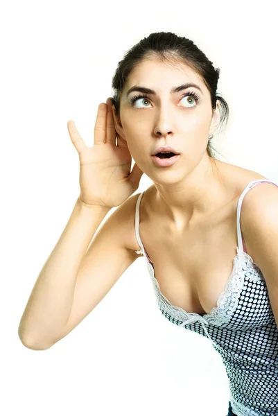 Garota surpresa ouvindo algo — Fotografia de Stock