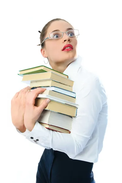Испуганная женщина с книгами — стоковое фото