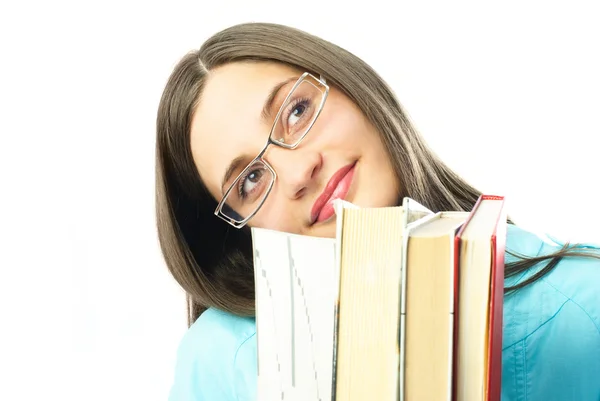 Verträumte Studentin mit Büchern — Stockfoto