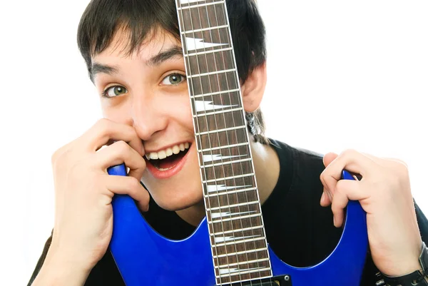 Young man with a guitar — Stock Photo, Image